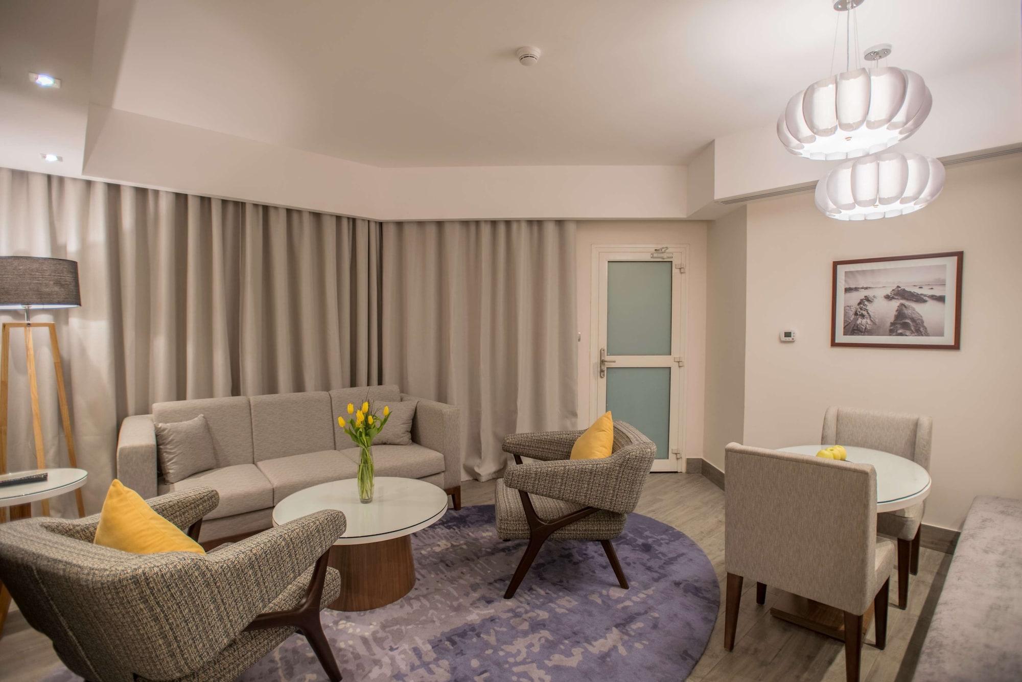 Radisson Blu Resort, Al Khobar Half Moon Bay Exterior foto The interior of a suite at the hotel